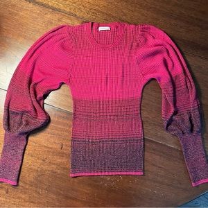 Ulla Johnson knit top with puff sleeve and sparkle thread on ombré pattern